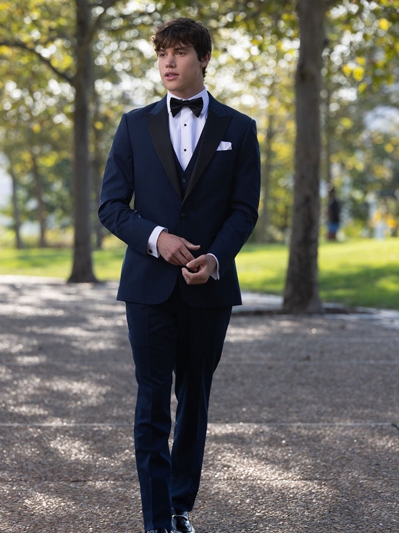 Photo of the model wearing a tuxedo