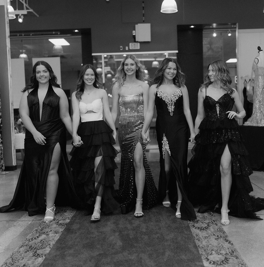 Photo of the models wearing a formal gown in black and white